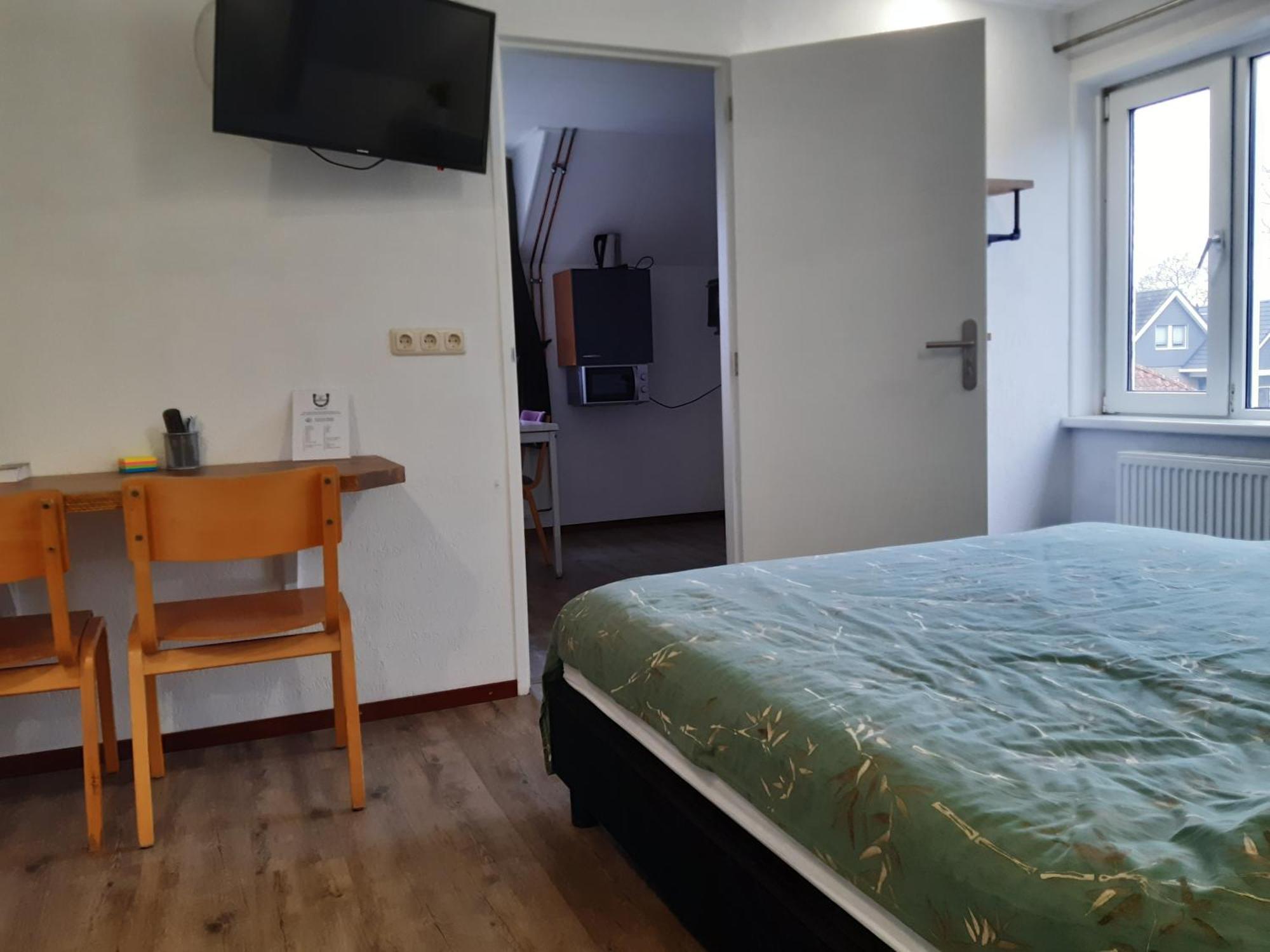 Pension Het Hoefijzer Бюрен Экстерьер фото